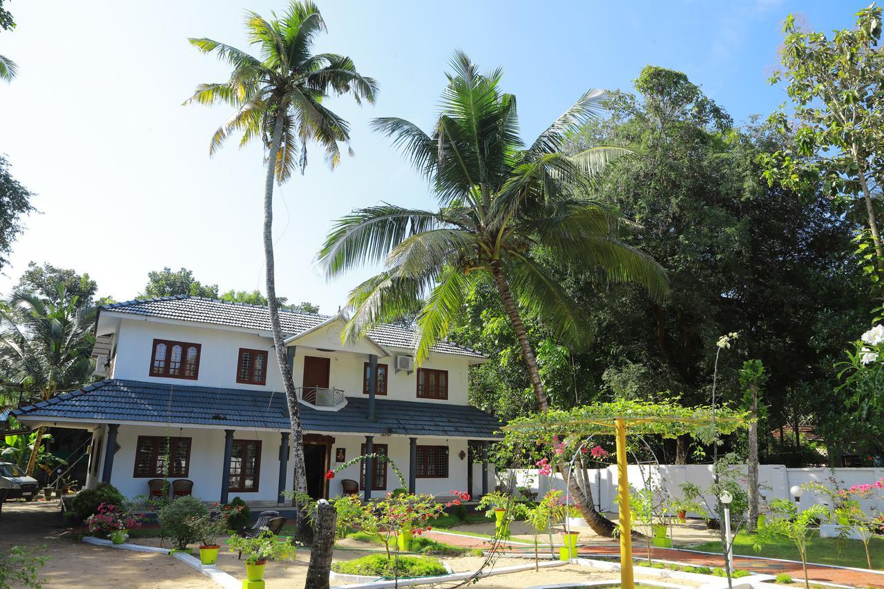 Апартаменты Marari Peterland Alappuzha Экстерьер фото